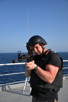 Fototapete - armed guard on board sea going vessel in aden gulf