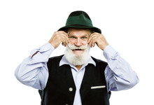 Old Bavarian Man In Hat On White Background