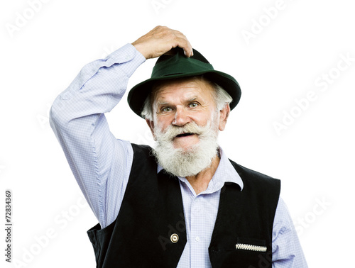 Fotografie, Obraz Old bavarian man in hat on white background
