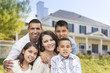 © Andy Dean - Hispanic Family in Front of Beautiful House