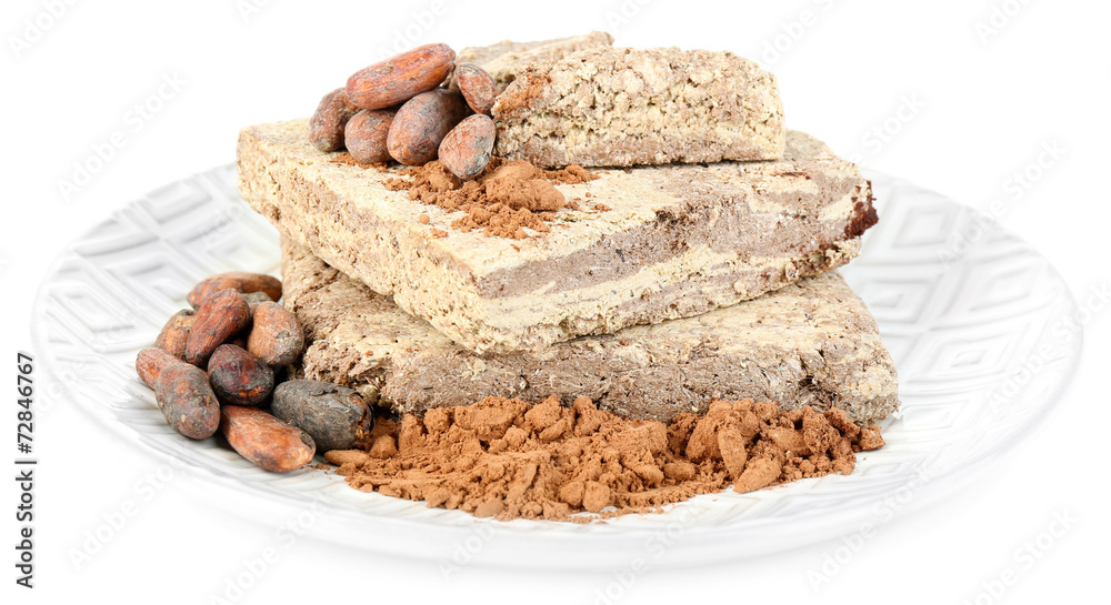 Sunflower halva with cocoa on plate isolated on white