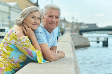 Mature couple walking in town