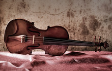Vintage Violin On Silk, Still Life Concept.