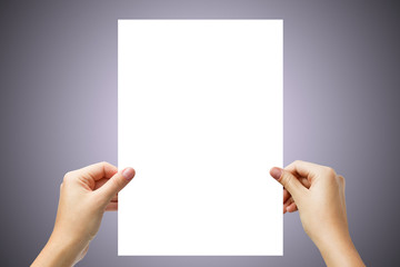 Hands holding a white page isolated on light purple background