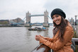 © XtravaganT - Young Asian woman sightseeing in London