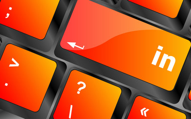Fototapete - in button on keyboard - business concept