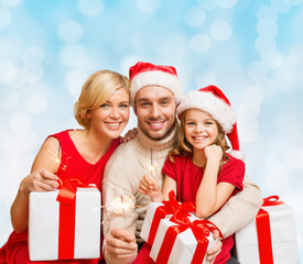 Sticker - happy family in santa helper hats with gift boxes