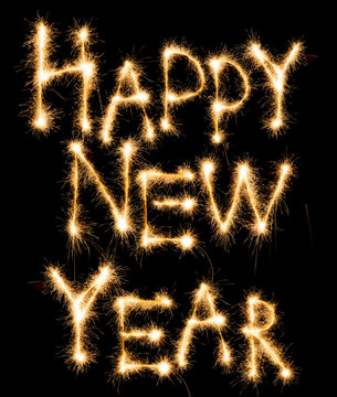 Happy New Year made of sparkles on black