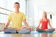 © pressmaster - Meditating in gym