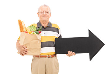 Sticker - Mature man holding a grocery bag and an arrow