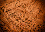 Fototapeta Panele - Tire tracks on the sand
