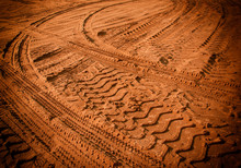 Tire Tracks On The Sand
