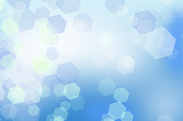 Abstract blue honeycomb background with bokeh effect.