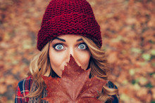 Beautiful Blonde With Leaf In Front Of Face