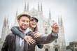 Leinwandbild Motiv Tourists at Duomo cathedral,Milan