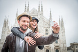 Fototapeta  - Tourists at Duomo cathedral,Milan