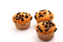 Chocolate Chip Muffin On A White Background.
