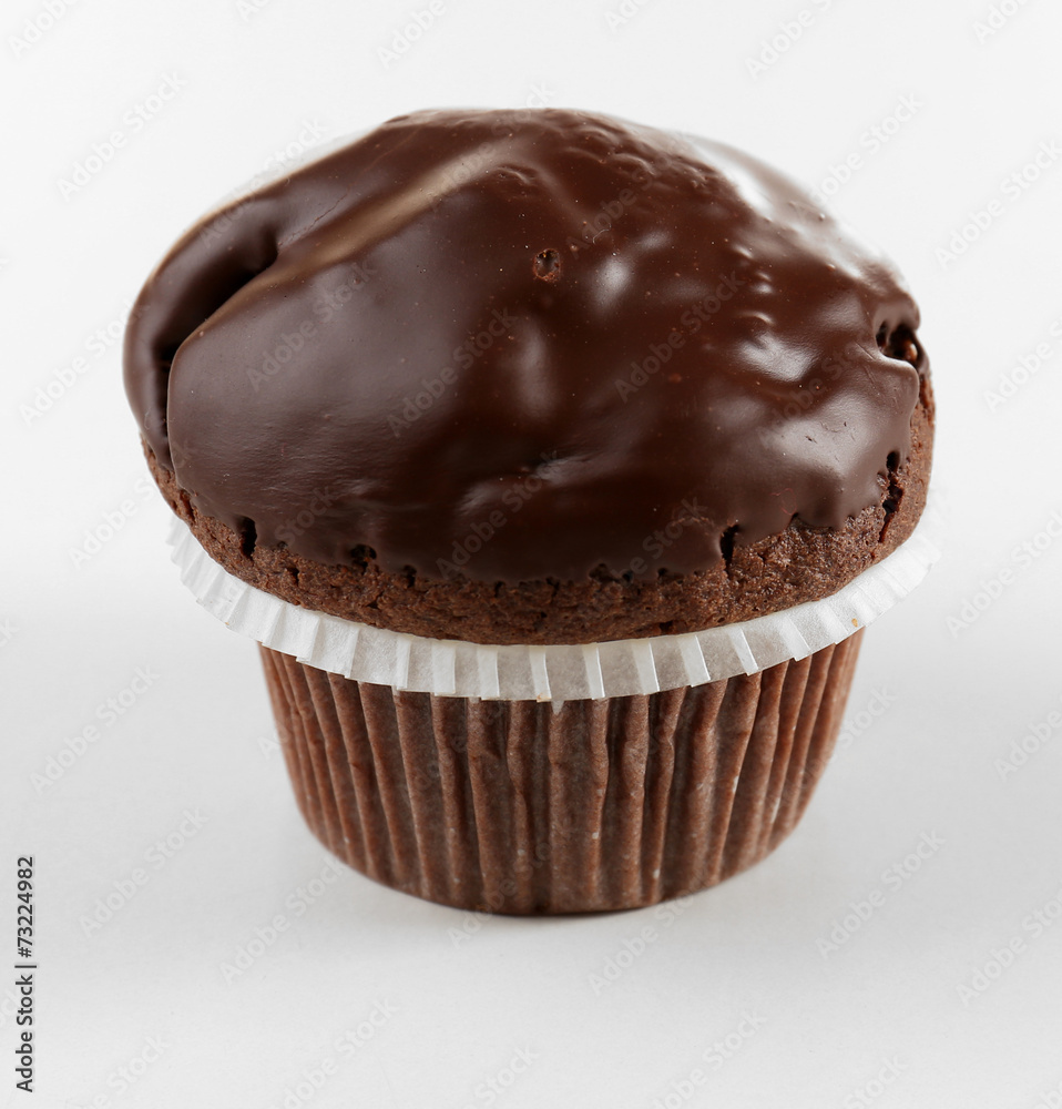 Yummy chocolate cupcake isolated on white