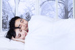 © Creativa Images - Lovely couple sleeping on bed
