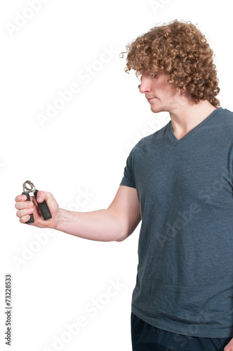 Fotografija  Man with hand grip exerciser