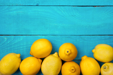 Lemons on the bright cyan background