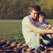 © guas - Lifestyle photo lovely father and son together resting outdoors