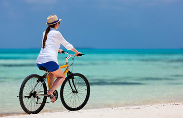 Sticker - Young woman biking