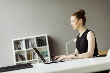 Young woman in the office