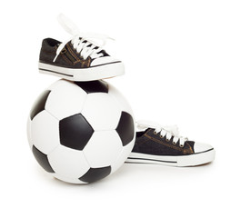 Wall Mural - soccer ball and sport shoes on white