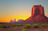 Fototapeta Sawanna - Monument Valley, USA colorful desert sunrise