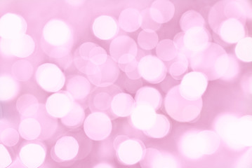 Wall Mural - Holiday pink background with blurred bokeh lights