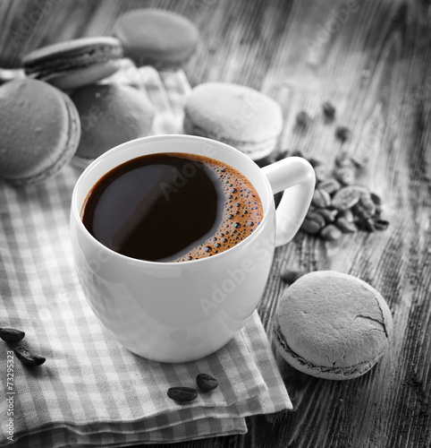 Naklejka na szybę Cup of coffee and french macaron.