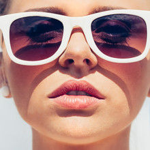 Beautiful Young Female Face With Sunglasses