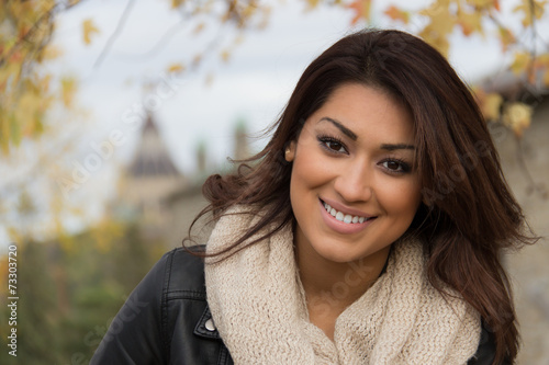 Fotografie, Obraz Gorgeous Latino woman outdoors during fall
