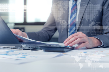 Wall Mural - Close up of business man typing on laptop computer with technolo