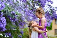 Two Little Sister Love And Have A Fun In Beautiful Blossom Garde