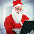 © Sabphoto - Santa Claus with Laptop