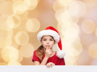 Wall Mural - smiling little girl in santa helper hat