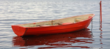 Red Boat On The Water