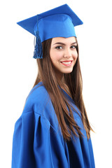 Woman graduate student wearing graduation hat and gown,