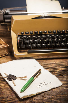 old typewriter, a pile of books and a lot of creativity