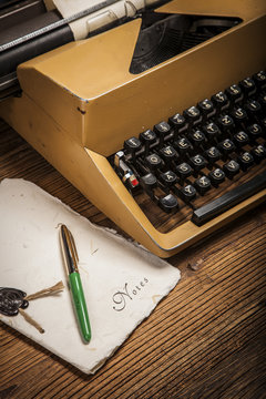 old typewriter, a pile of books and a lot of creativity