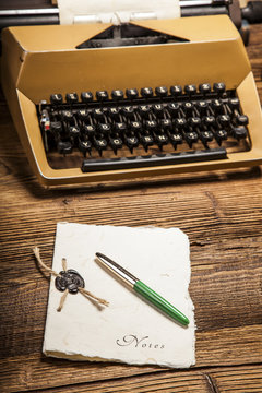 old typewriter, a pile of books and a lot of creativity
