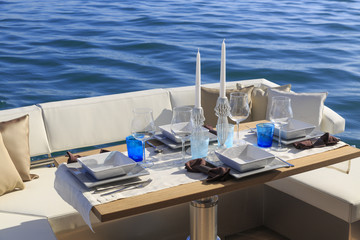 lunch on motor yacht, Table setting at a luxury yacht.