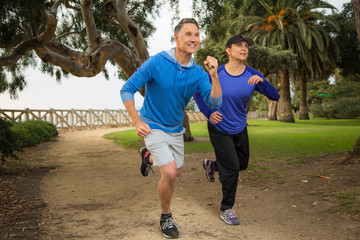 Elder couple running in the park