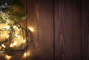 Christmas lights and snow fir tree