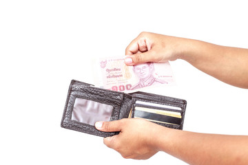 Hand holding thai money on white background.Hand holding thai mo