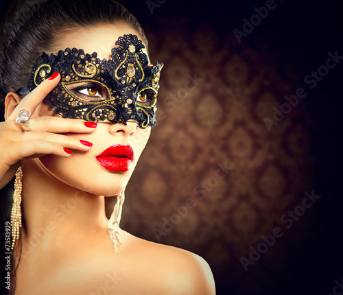 Beauty model woman wearing masquerade carnival mask
