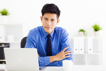 Wall Mural - Young business man working in the  office