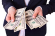© missty - Businessman giving cash dollars in the hands